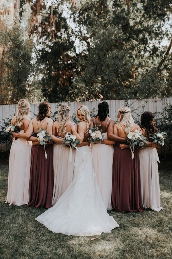 blush wedding dress with burgundy bridesmaids